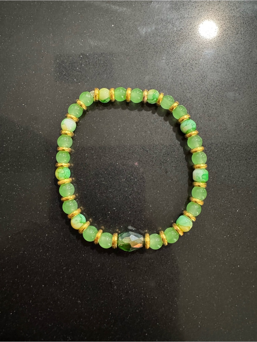 Handmade Green Beaded Stretch Bracelet with Gold Accents
